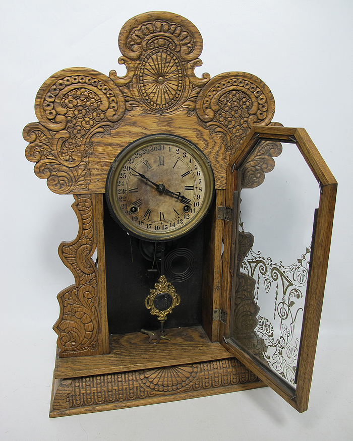 Late 19th Century Ingraham GILA Oak Gingerbread Calendar Mantle Shelf
